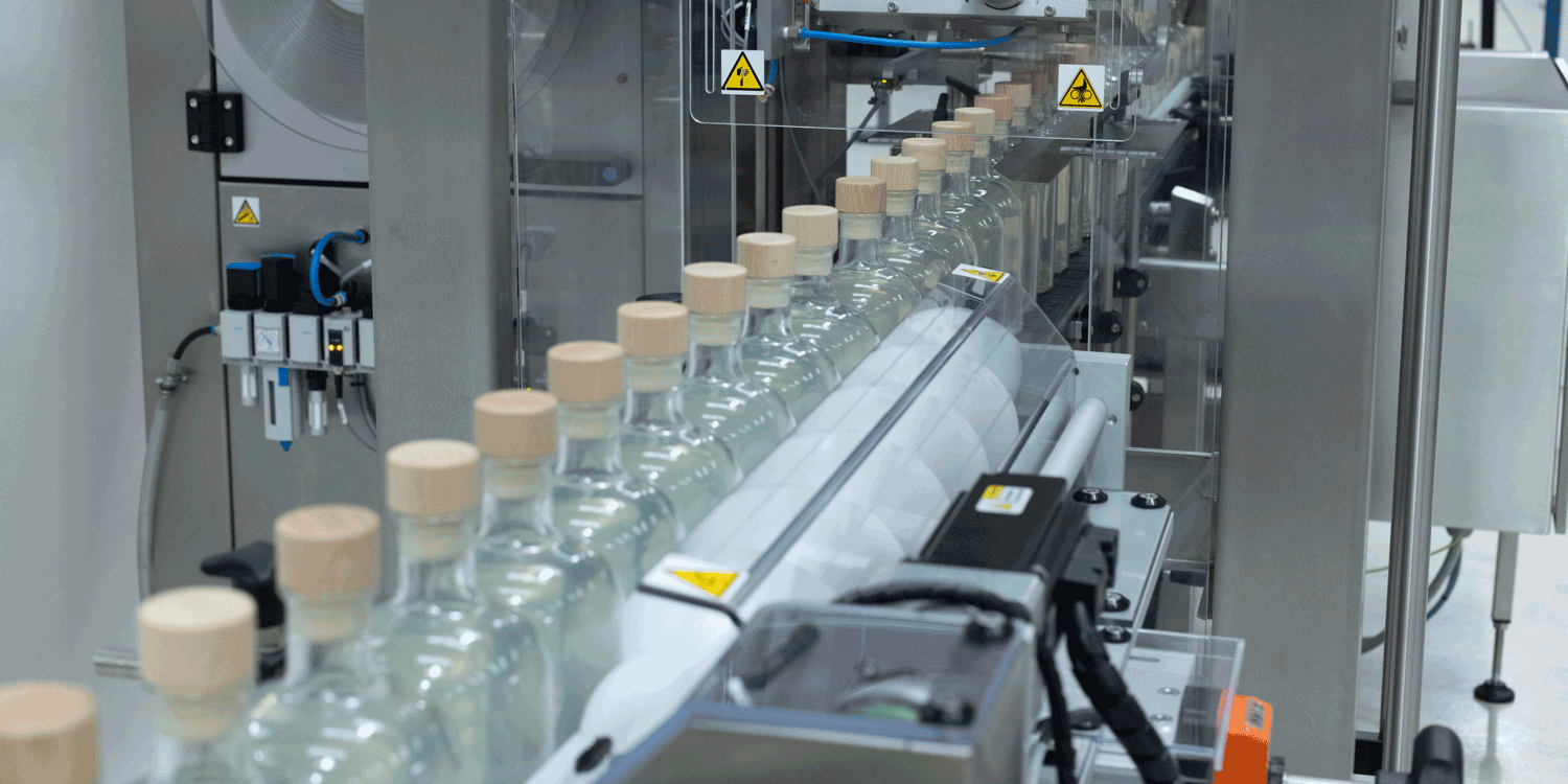 Sleevit-DF-Series-Shrink-Sleeve-Labeler-Bottles1 DF Series Shrink Sleeve Applicator